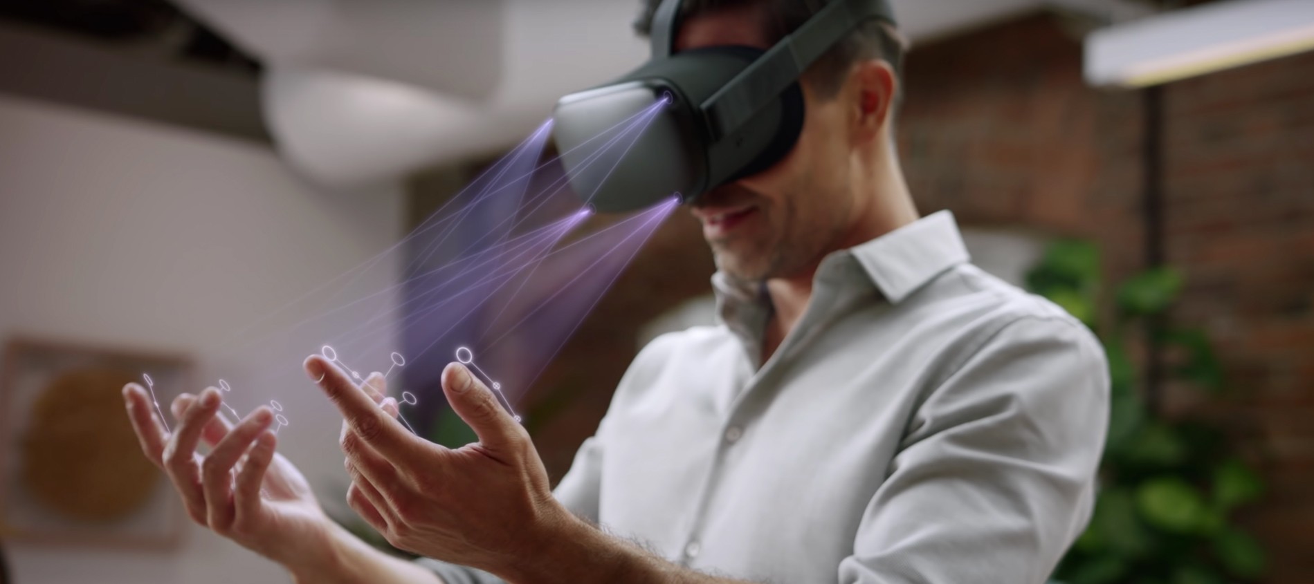 Guy wearing oculus quest.