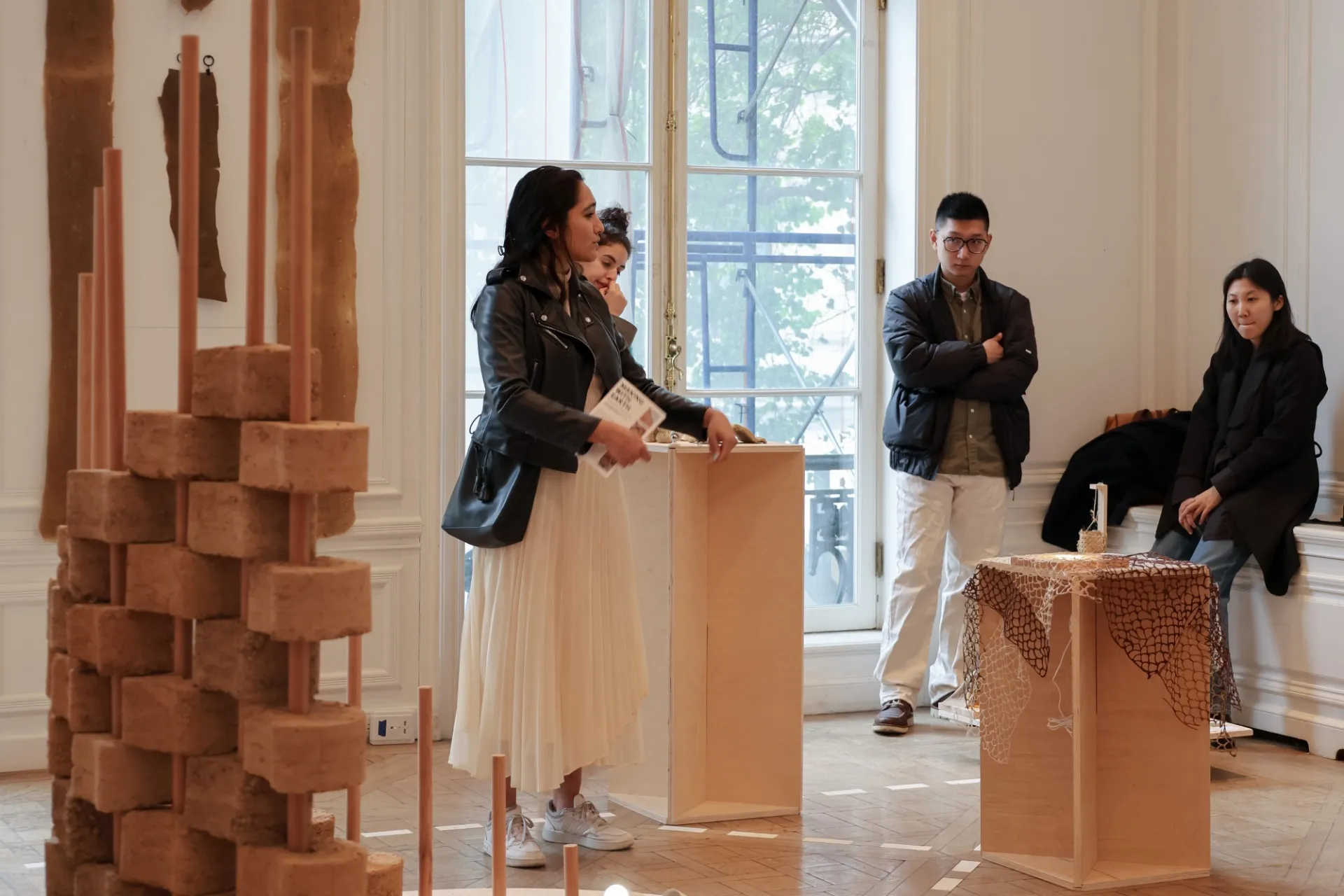 Course students presenting their work in the gallery space