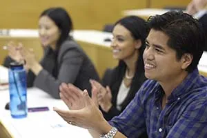 group of students clapping